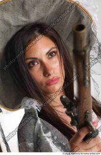 LUCI_AVIOL STANDING POSE WITH TWO GUNS 